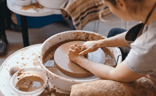 people making pottery 