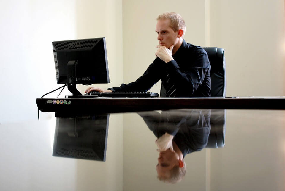 an image of a man working in an office 