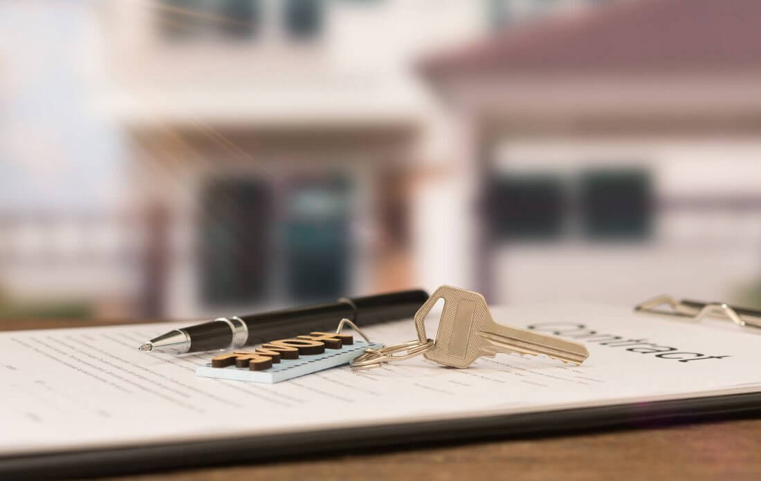 Apartment keys on a checklist