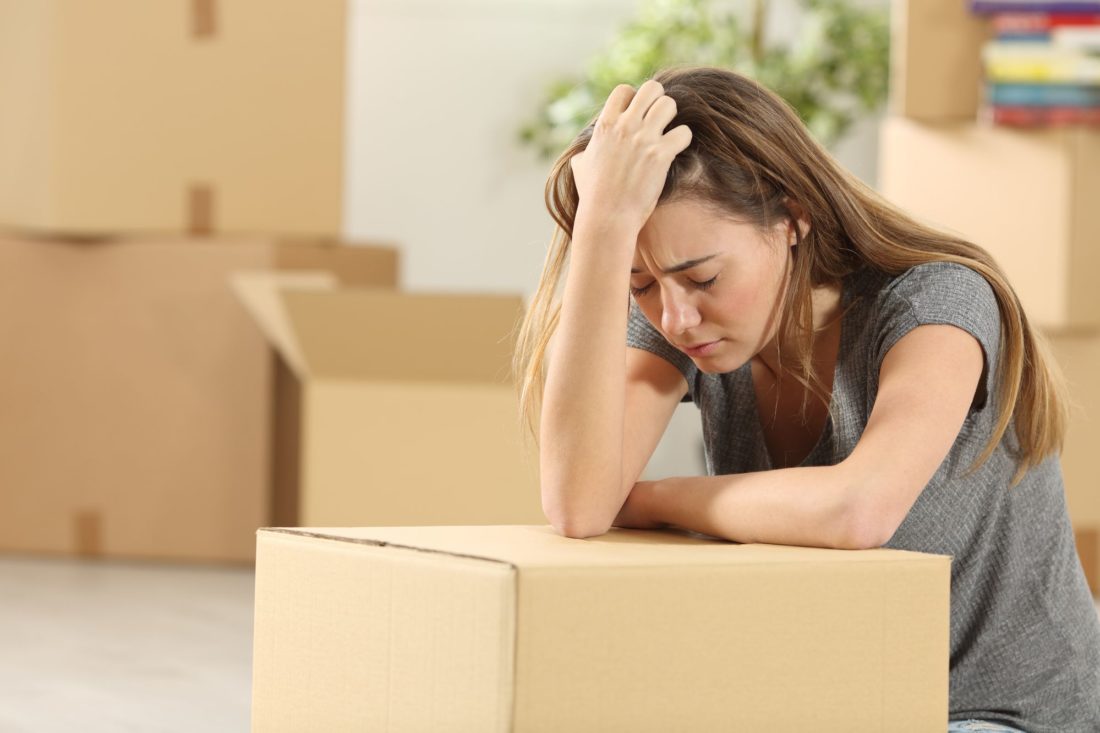 Girl experiencing negative emotions after long-distance moving