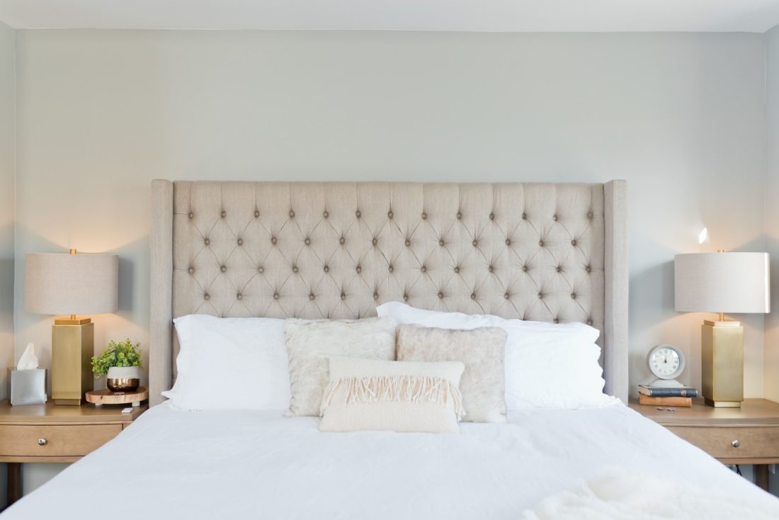 White bed with sheets in the bedroom