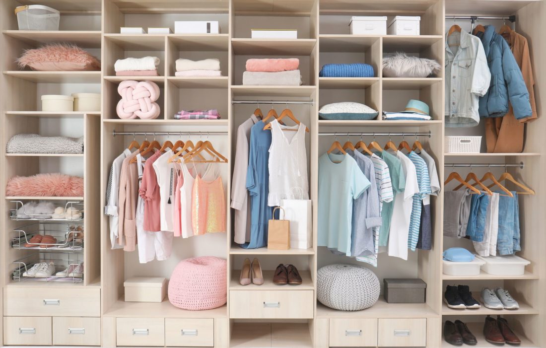 Shelves with organized clothing