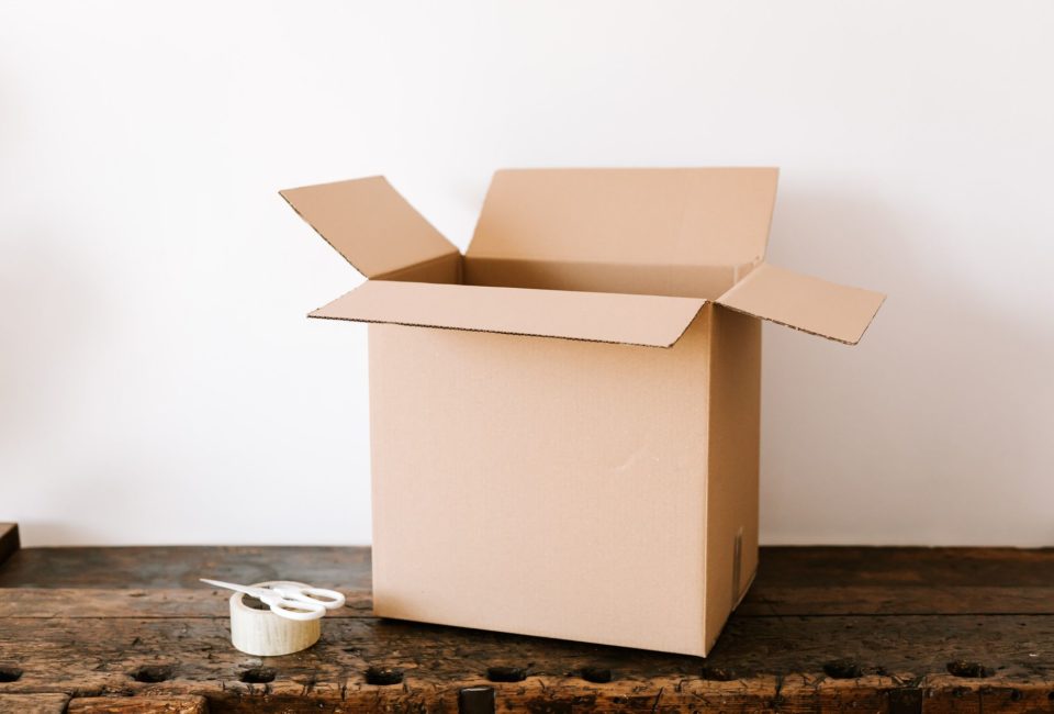 An empty cardboard box placed on the table