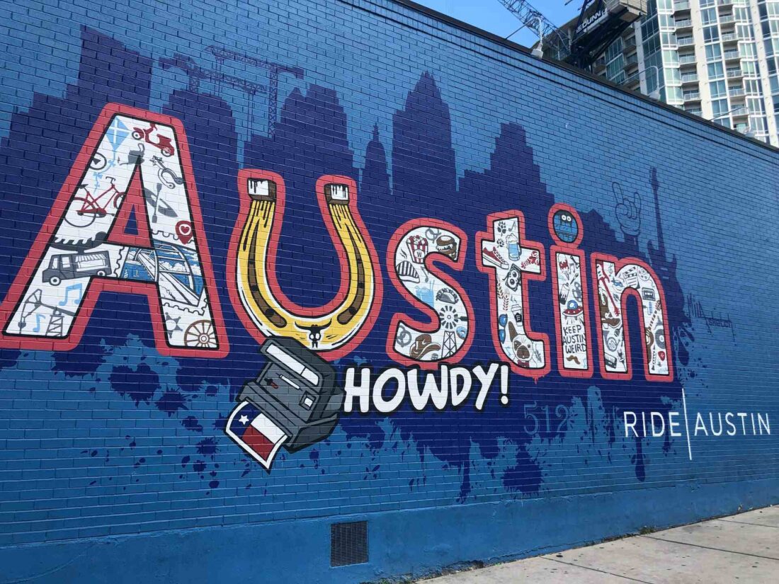 Austin graffiti on the wall Long Distance USA Movers logo