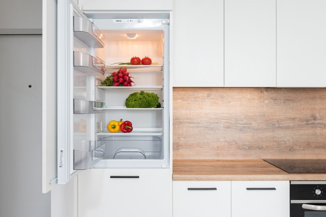 White fridge with open doors 