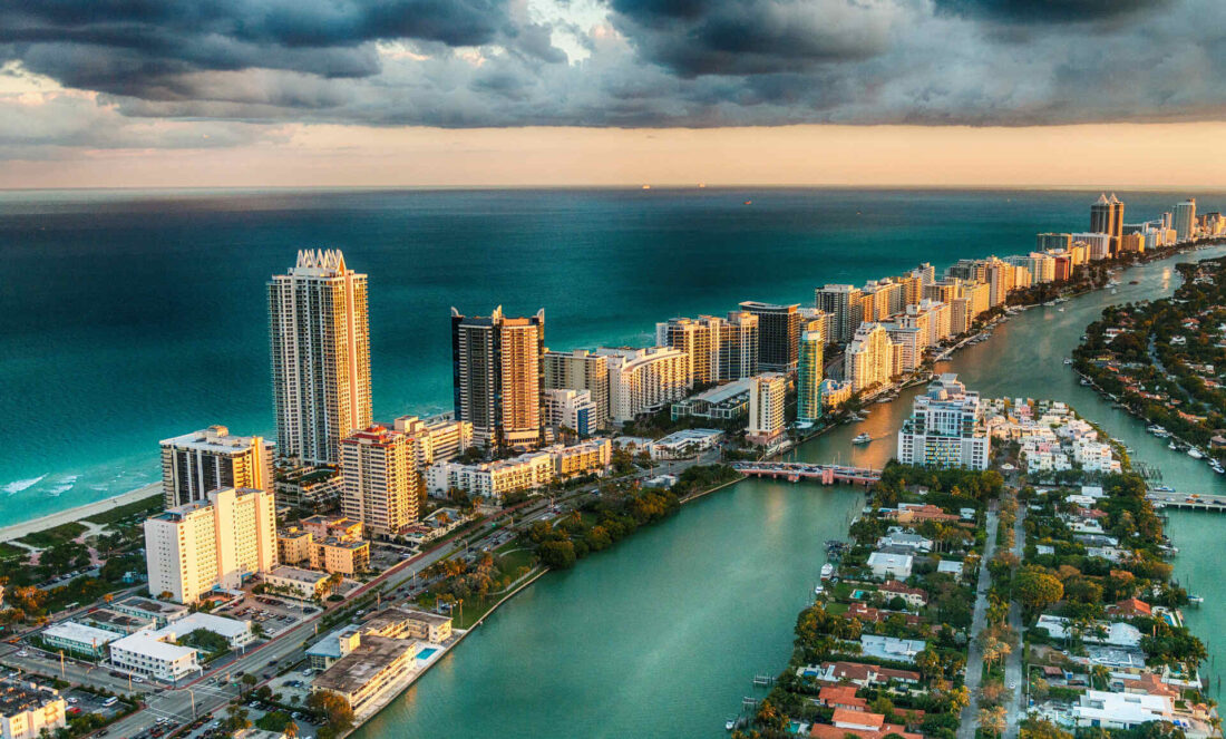 View of Miami Beach from the air Long Distance USA Movers logo