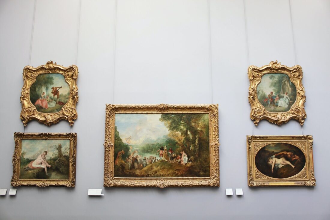 Paintings in frames on the wall