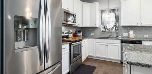 Kitchen furnished with appliances